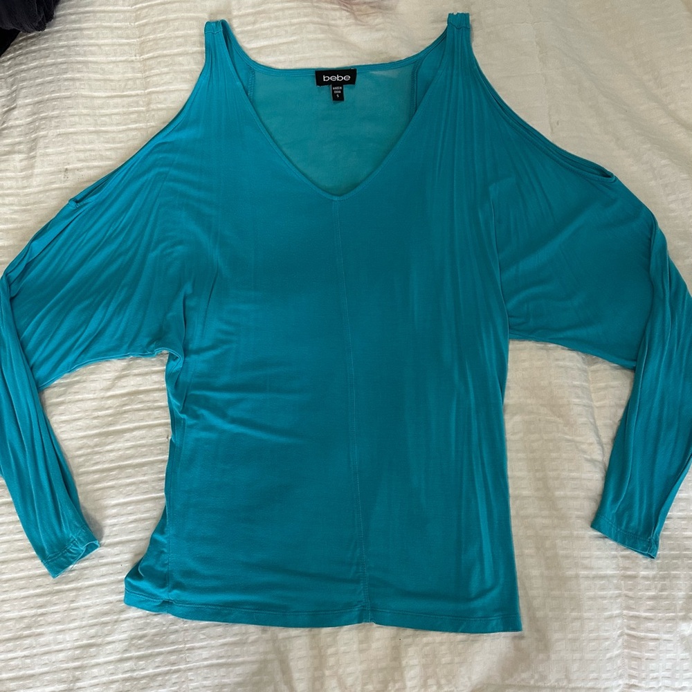 Bebe turquoise cut out shoulder sheer back blouse